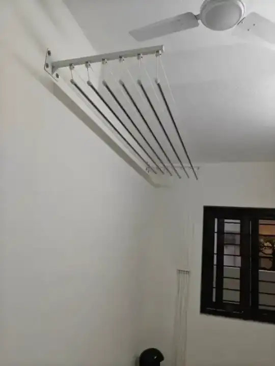 Ceiling cloth hanger installation in Chennai bedroom